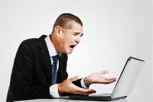 100464590-businessman-yelling-at-computer-600-gettyp.600x400